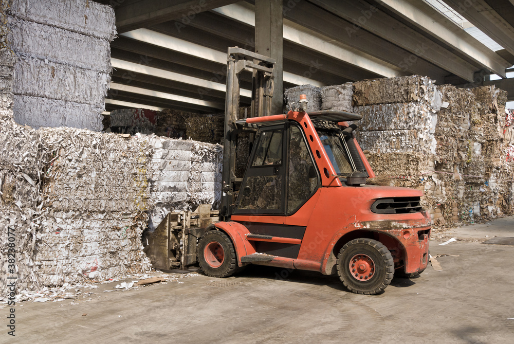 Recycling of waste paper with fork lift Recycling of waste paper with fork lift
