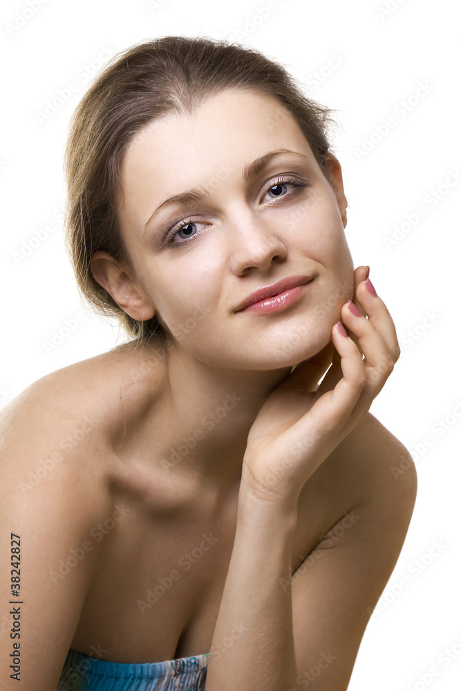 Portrait of a beautiful girl with arm around her cheek Portrait of a beautiful girl with arm around her cheek