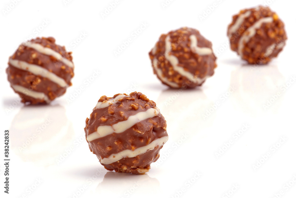 Sweet chocolate balls filled with hazelnuts.