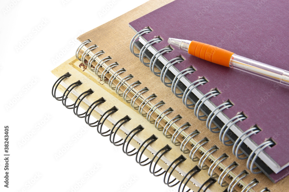 stack of ring binder book or notebook and pen isolated stack of ring binder book or notebook and pen isolated
