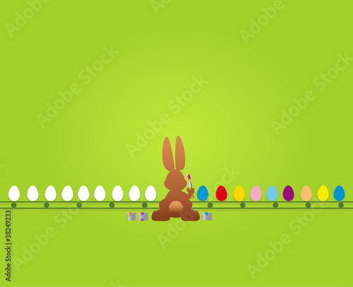 Osterhase malt am Fliessband Eier an