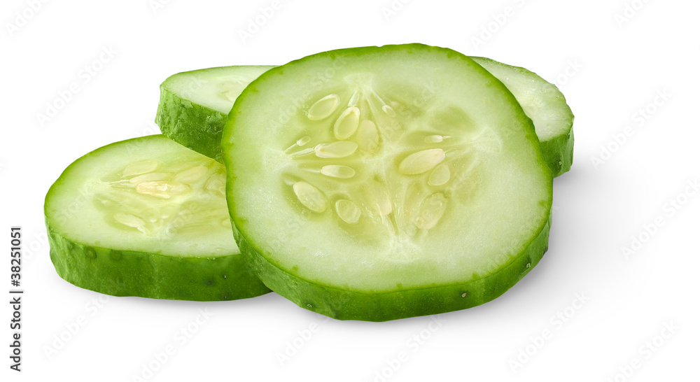 Isolated cucumber slices. Pieces of fresh cucumber isolated on white background Isolated cucumber slices. Pieces of fresh cucumber isolated on white background