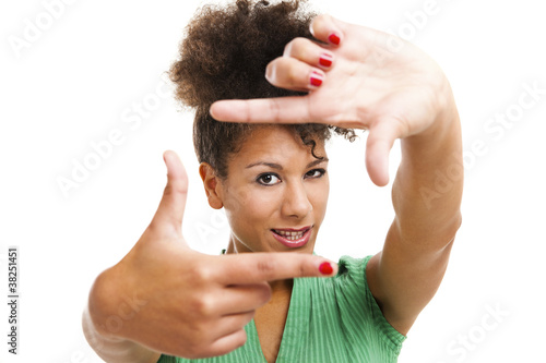Beautiful woman creating a frame with fingers