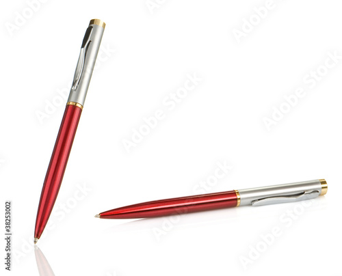 red and silver shining pens on white