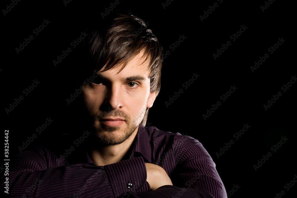 Fototapeta premium Young man with a serious look
