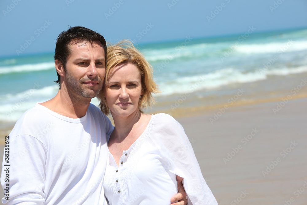 Couple embracing at the oceanside