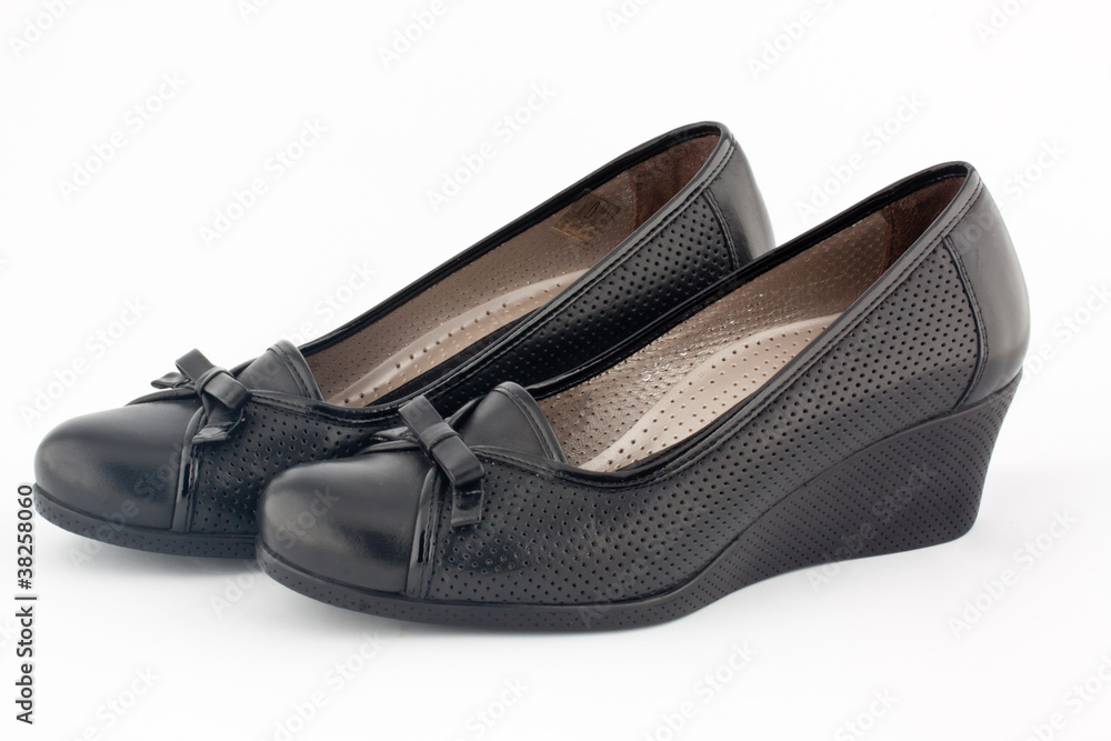 a pair of black platform shoes a pair of black platform shoes