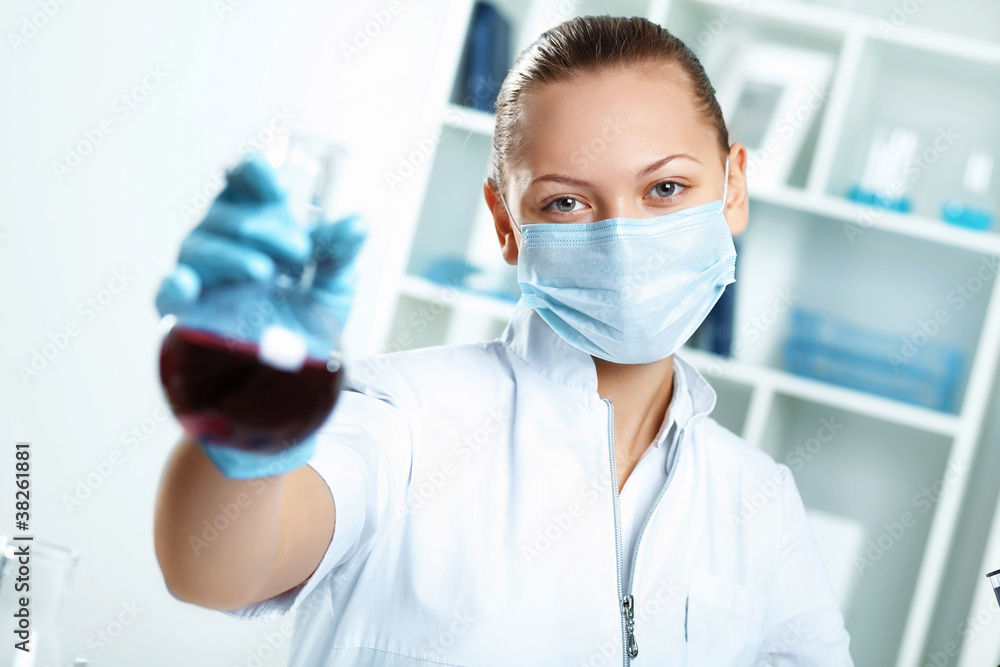 Young scientist working in laboratory Young scientist working in laboratory