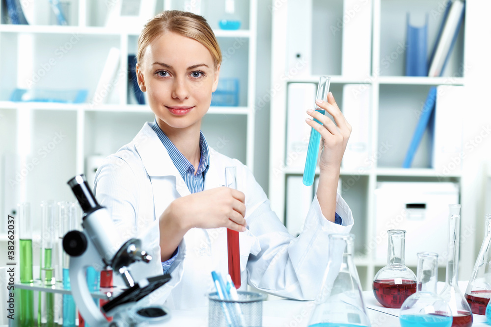 Young scientist working in laboratory Young scientist working in laboratory