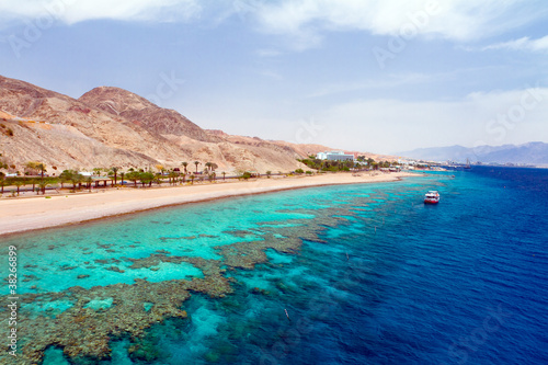 Panorama coastline of Red sea from coral reef photo