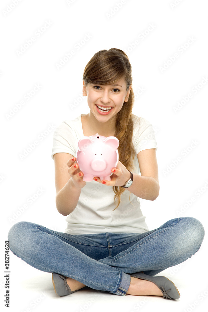 Young woman holding piggybank Young woman holding piggybank
