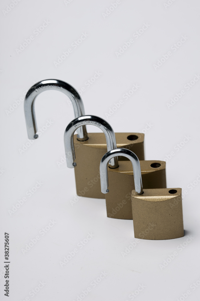 three locks on a white background
