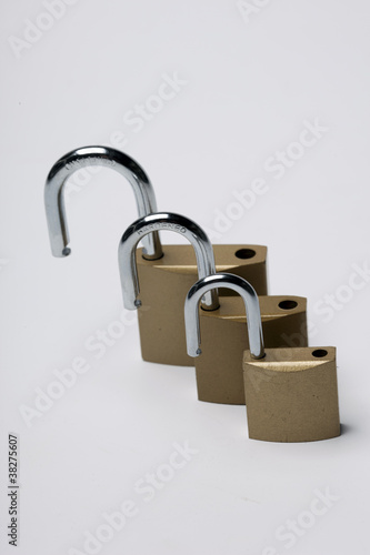 three locks on a white background