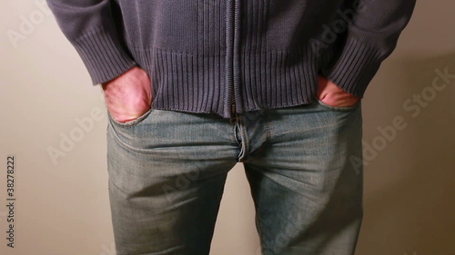 Man showing his empty pockets