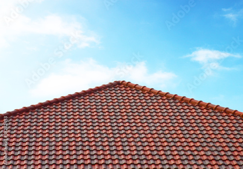 brick roof with clear cloud blue sky © geargodz