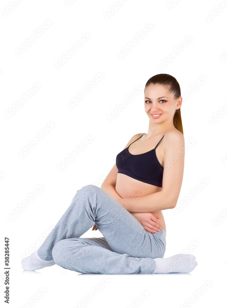 Young woman doing fitness exercises Young woman doing fitness exercises