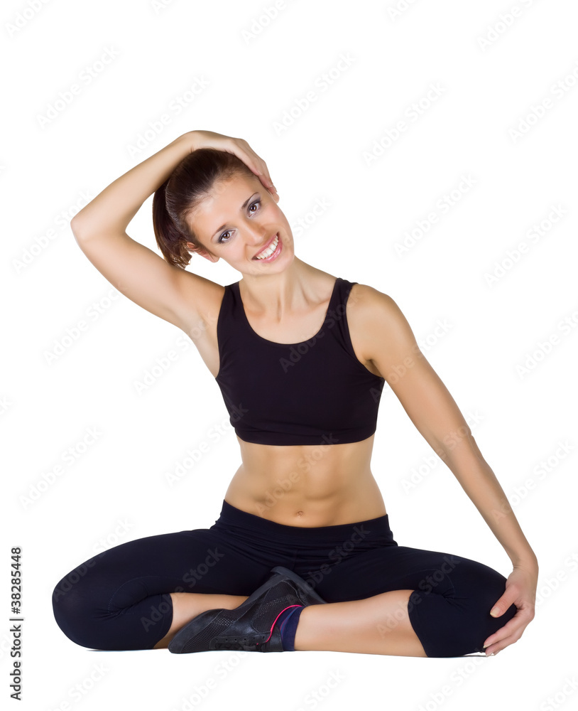 Young woman doing fitness exercises Young woman doing fitness exercises