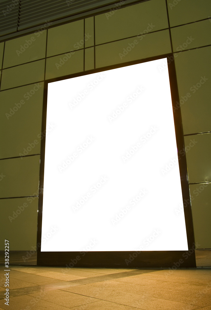 a blank street advertising sign at night a blank street advertising sign at night