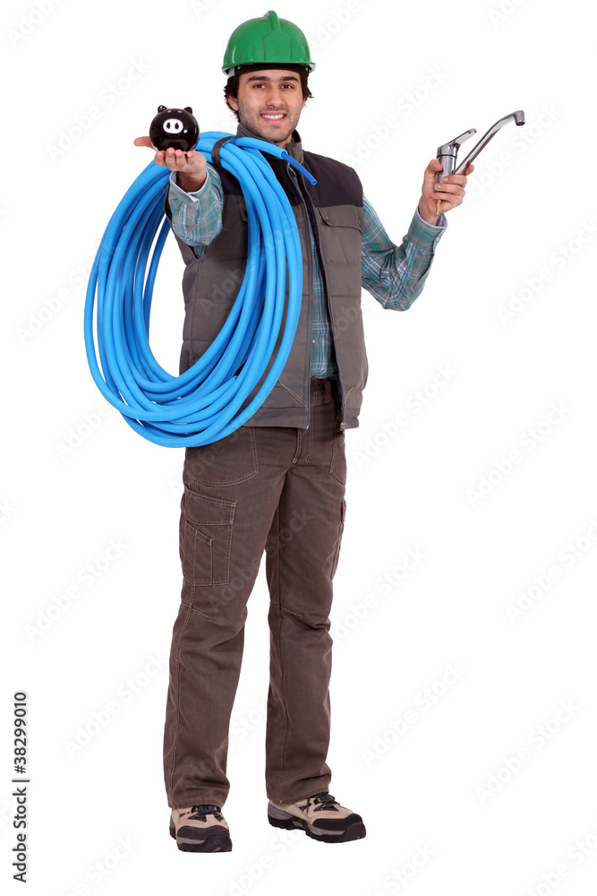 Plumber holding tap and piggy-bank Plumber holding tap and piggy-bank