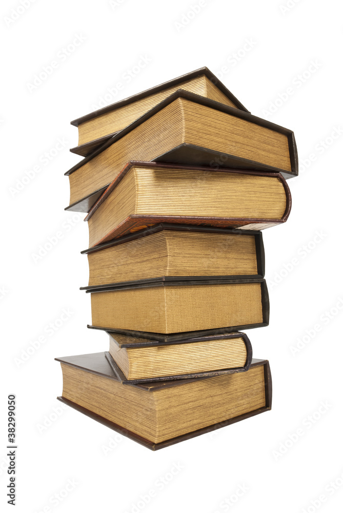 Old antique books against a white background