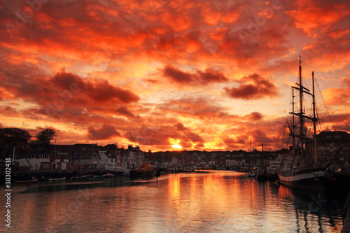 Weymouth harbour, Dorset England, sunset, ship