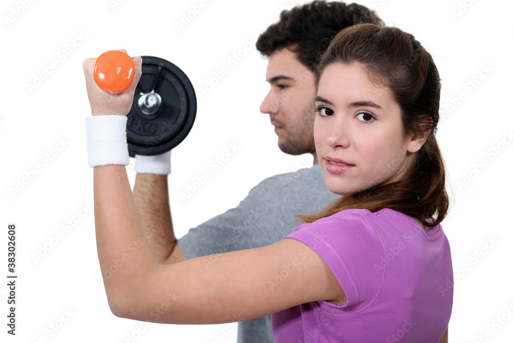 Couple working out together Couple working out together