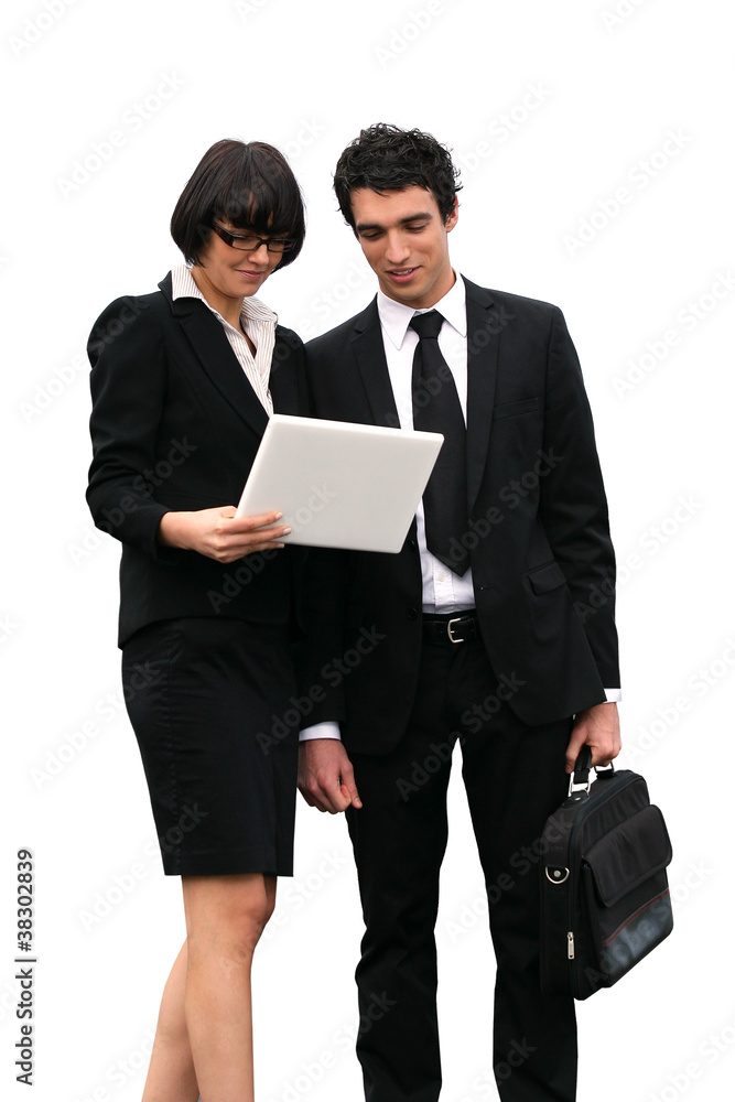 Business partners reading important document Business partners reading important document