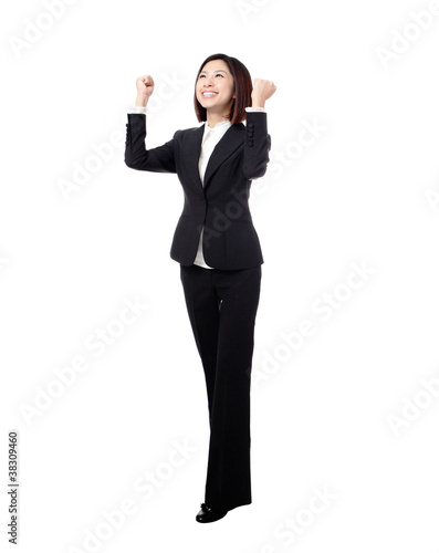 Success winner business woman in full length with her arms up