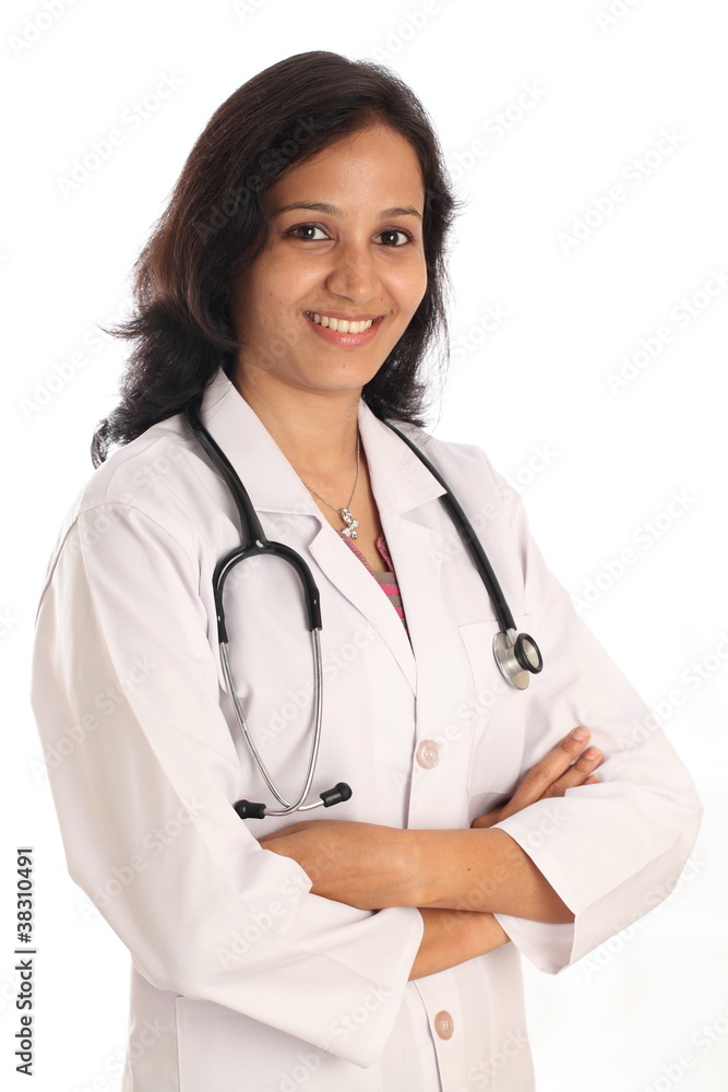Arms crossed woman doctor against white Arms crossed woman doctor against white