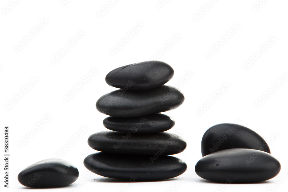 zen stones. Black massage stones stacked, isolated. zen stones. Black massage stones stacked, isolated.
