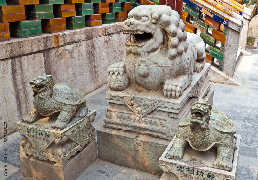 Chinese guardian lion and two tirtles