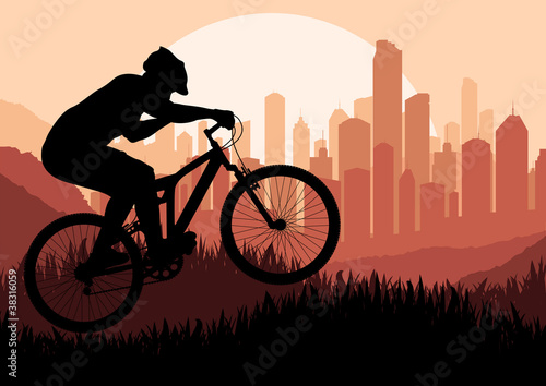 Mountain bike rider in skyscraper city landscape