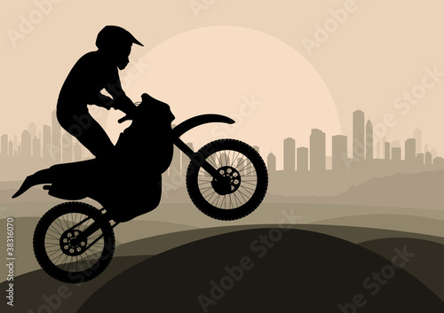 Motorbike rider in skyscraper city landscape