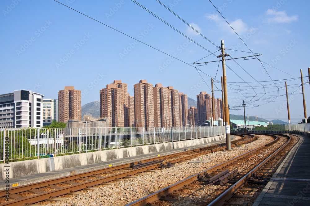 Naklejka premium Tuen Mun downtown and railway of light rail