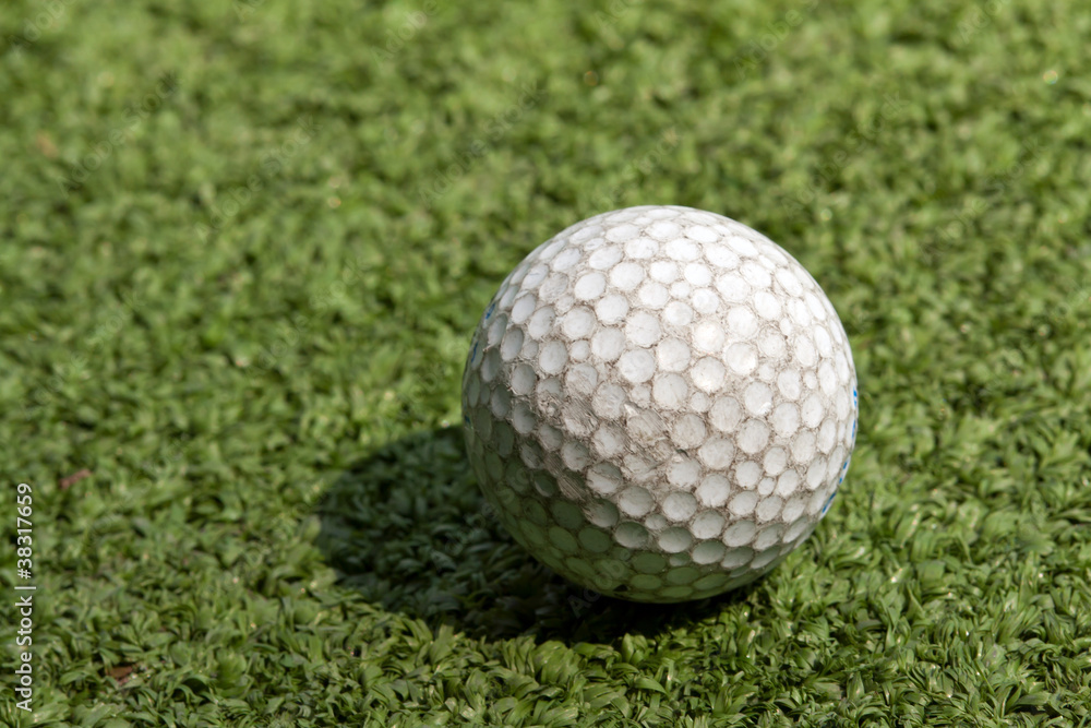 Fototapeta premium old scratched dirty golf ball