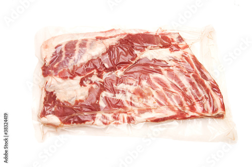 Fresh pork meat chest in vacuum