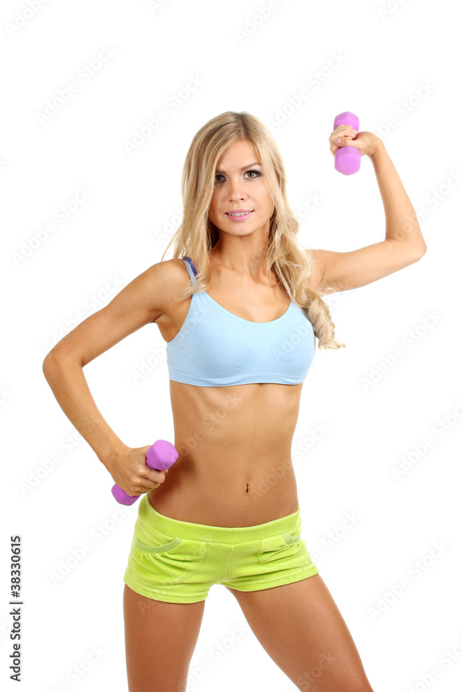 Beautiful fitness girl with dumbbells isolated on white Beautiful fitness girl with dumbbells isolated on white