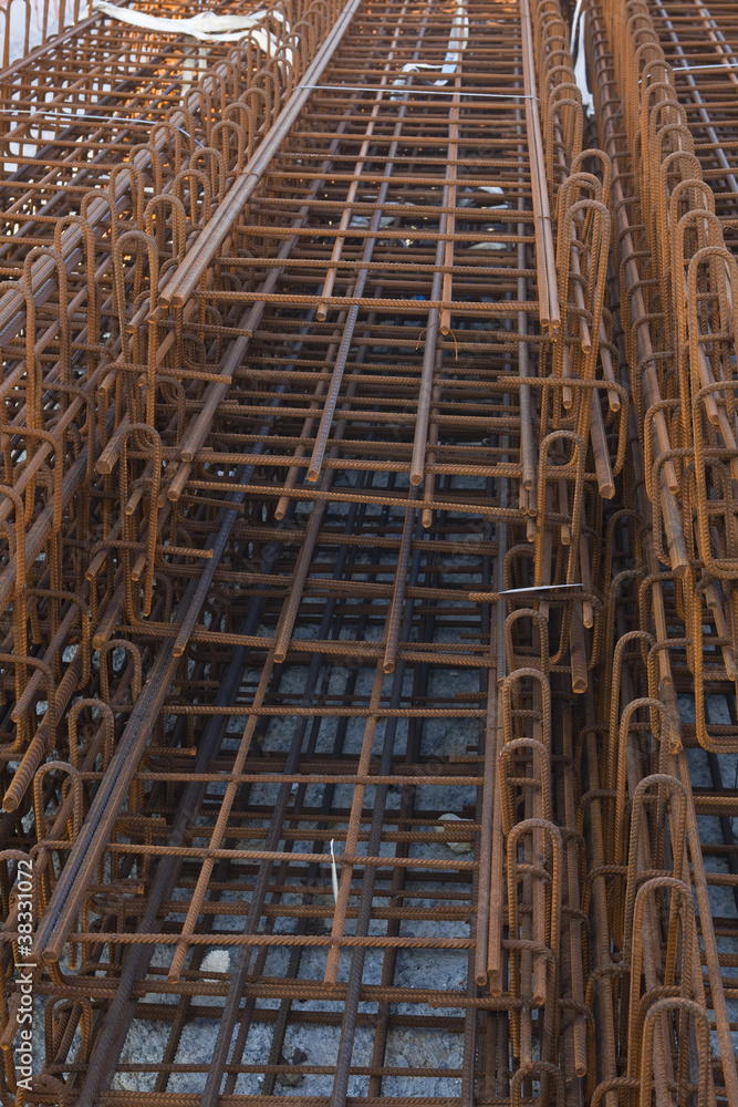 Steel rebars waiting to be used on a construction site.