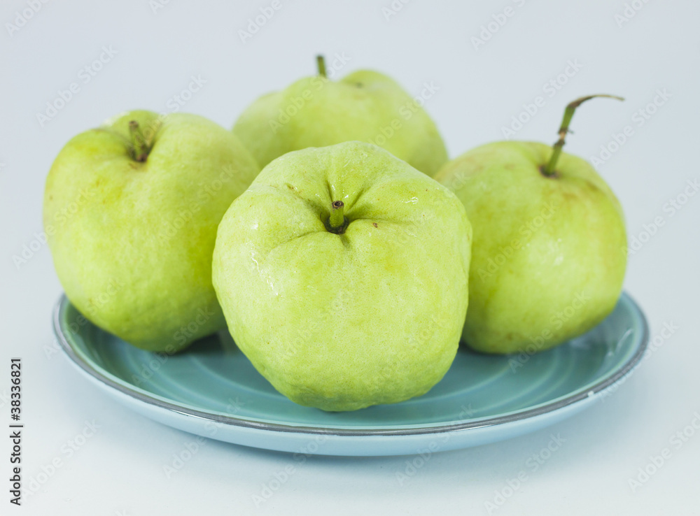 Guava fruit has green skin and white flesh, vitamin C.