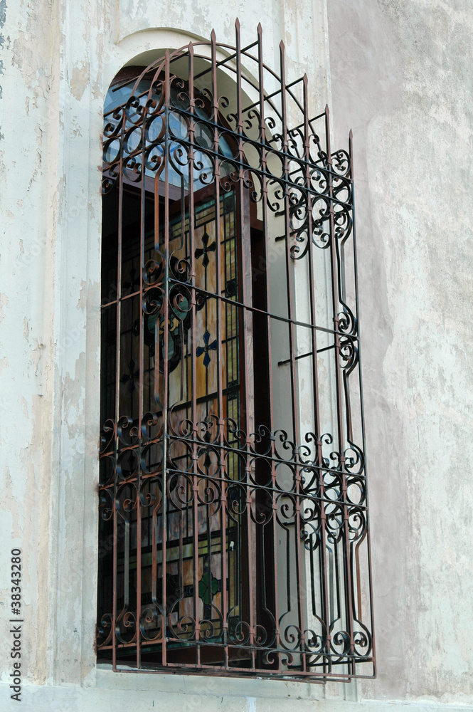 Colorful window with grille