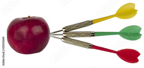 darts hitting an apple