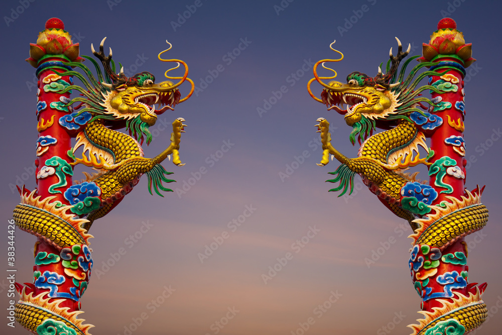 Fototapeta premium Climb dragons statue two towers in the sky.