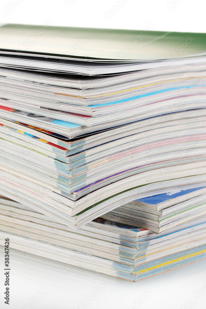 Stack of magazines isolated on white Stack of magazines isolated on white