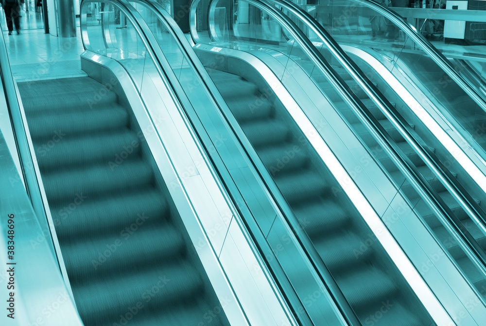 Obraz premium Three moving escalators