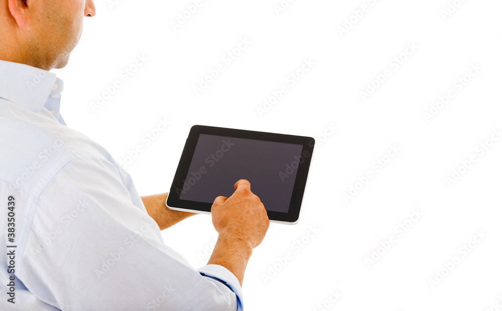 Handsome man using a tablet computer against a white background Handsome man using a tablet computer against a white background