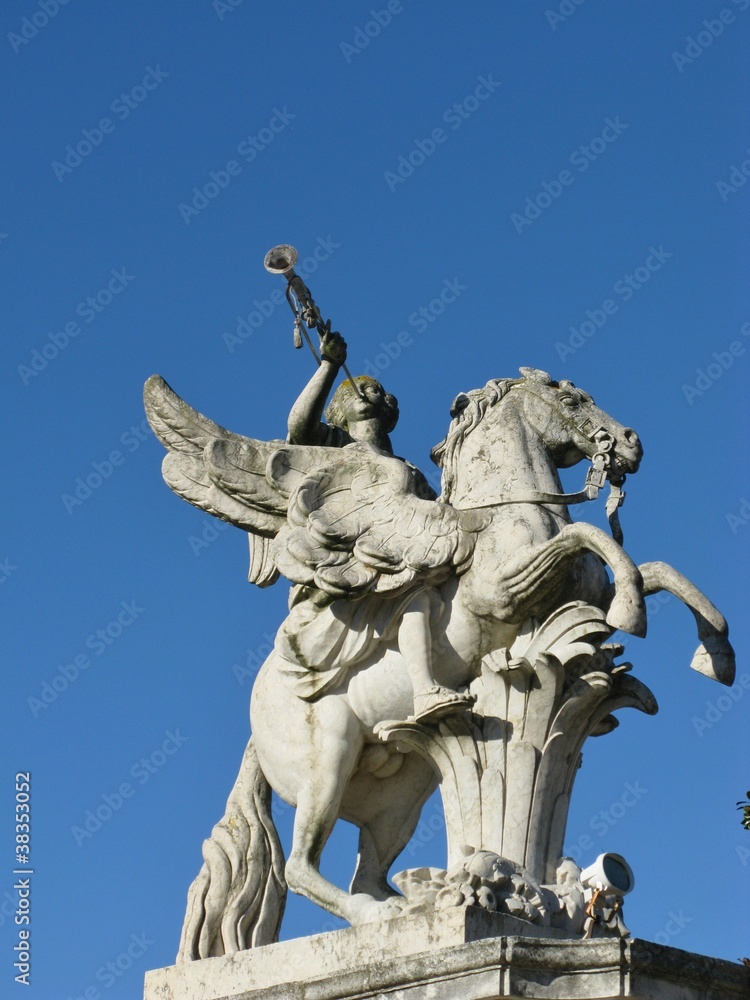One of the statues of Queluz castle in Portugal One of the statues of Queluz castle in Portugal