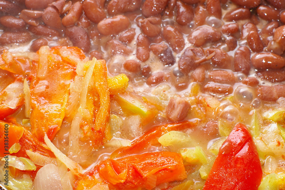 Stewed tomatoes and pepper with boiling brown beans Stewed tomatoes and pepper with boiling brown beans