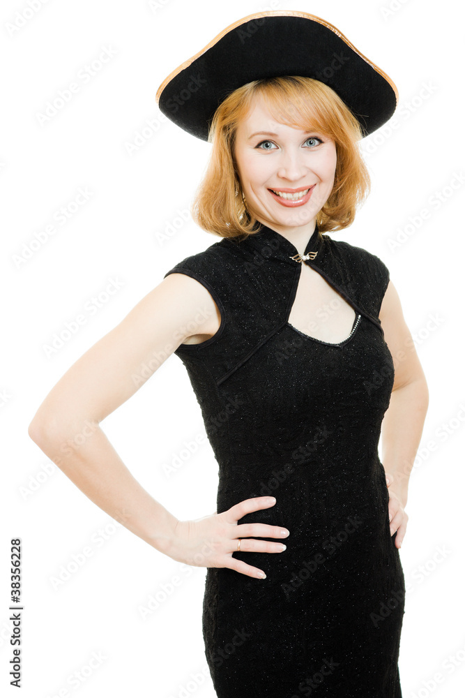 A beautiful woman in a black pirate hat on a white background. A beautiful woman in a black pirate hat on a white background.