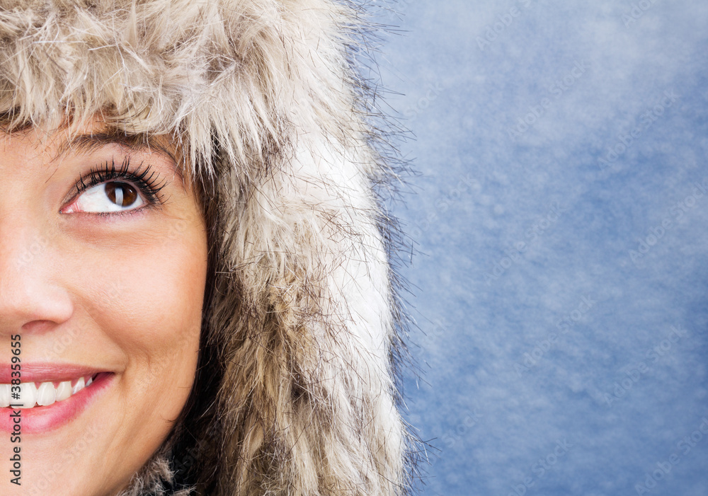 Half of a beautiful smiling woman's face Half of a beautiful smiling woman's face