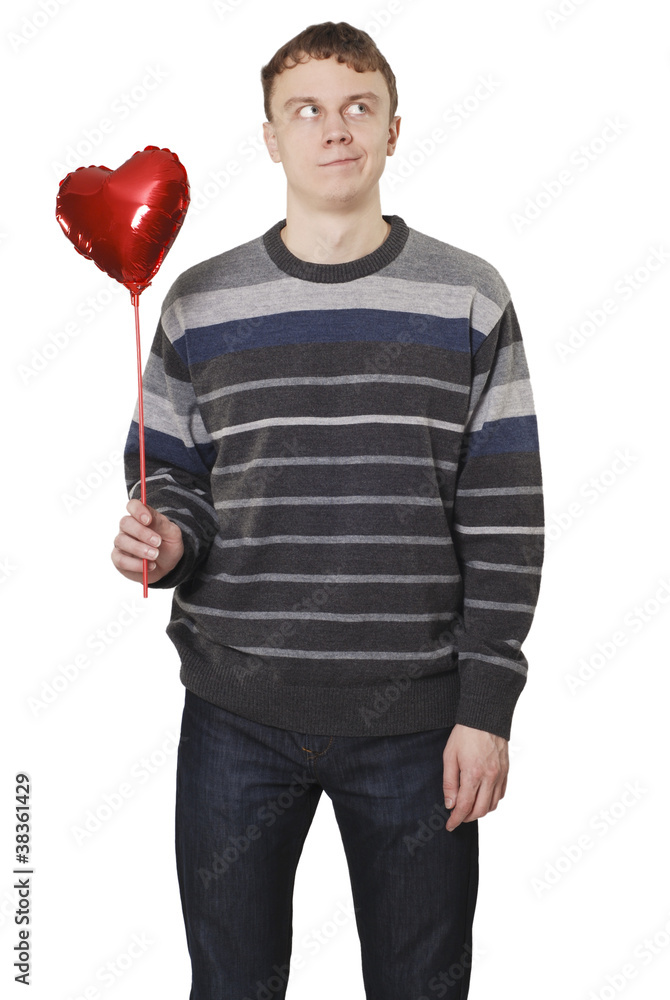 Young handsome man with red heart balloon Young handsome man with red heart balloon